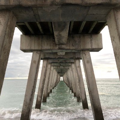 view from underneath the popular venice fishing pier in venice, fl